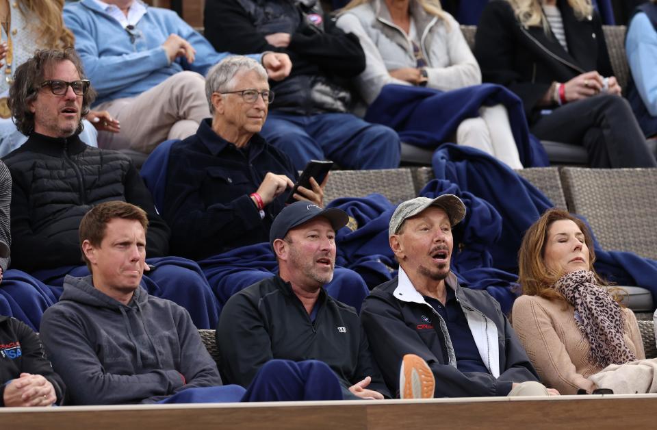 Bill Gates watches a tennis match with Larry Ellison at the BNP Paribas Open 2024.