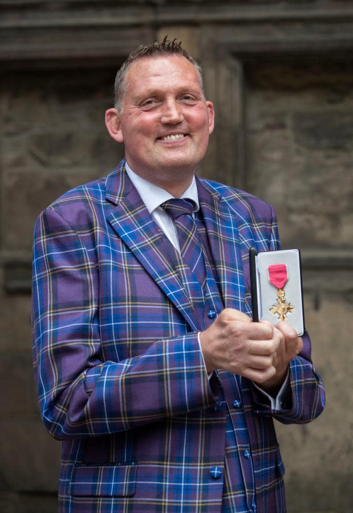 Doddie Weir after receiving his OBE medal from the Queen during an investiture ceremony at the Palace of Holyroodhouse in 2019.