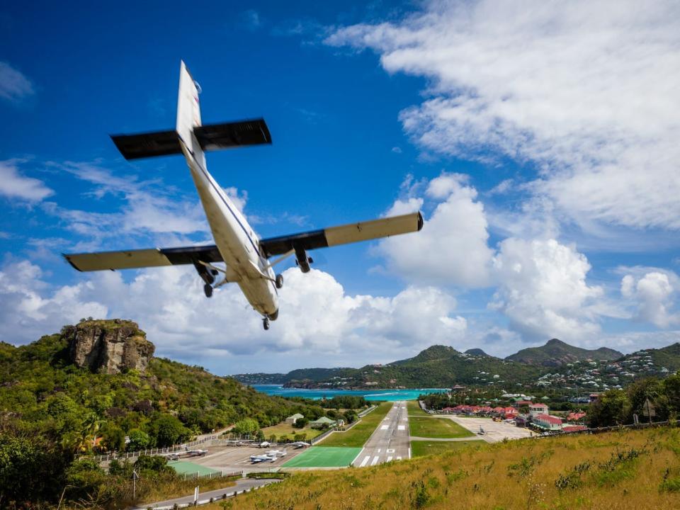 An aircraft lands on the island's airport.