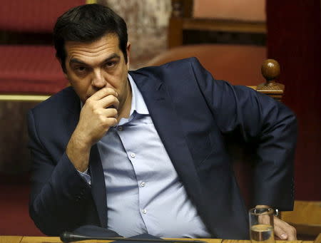 Greek Prime Minister Alexis Tsipras looks on during a parliamentary session in Athens, Greece July 23, 2015. REUTERS/Yiannis Kourtoglou