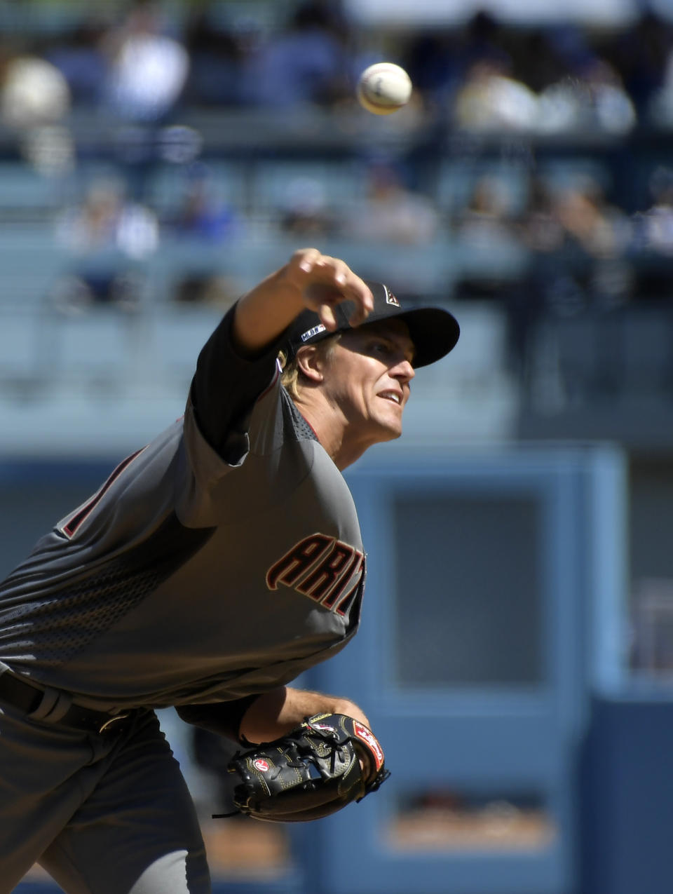 Arizona Diamondbacks starting pitcher Zack Greinke throws to the plate during the first inning of a baseball game against the Los Angeles Dodgers Thursday, March 28, 2019, in Los Angeles. (AP Photo/Mark J. Terrill)