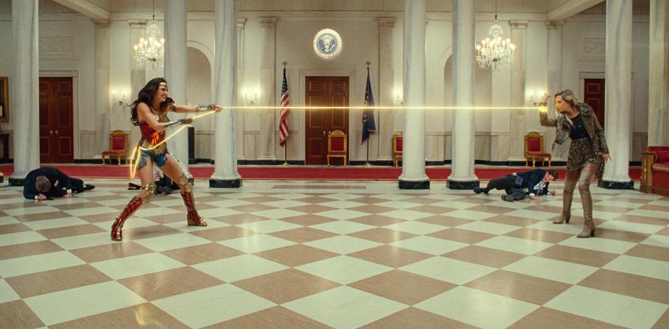 Wonder Woman (Gal Gadot, left) and Cheetah (Kristen Wiig) tussle in the White House in "Wonder Woman 1984."