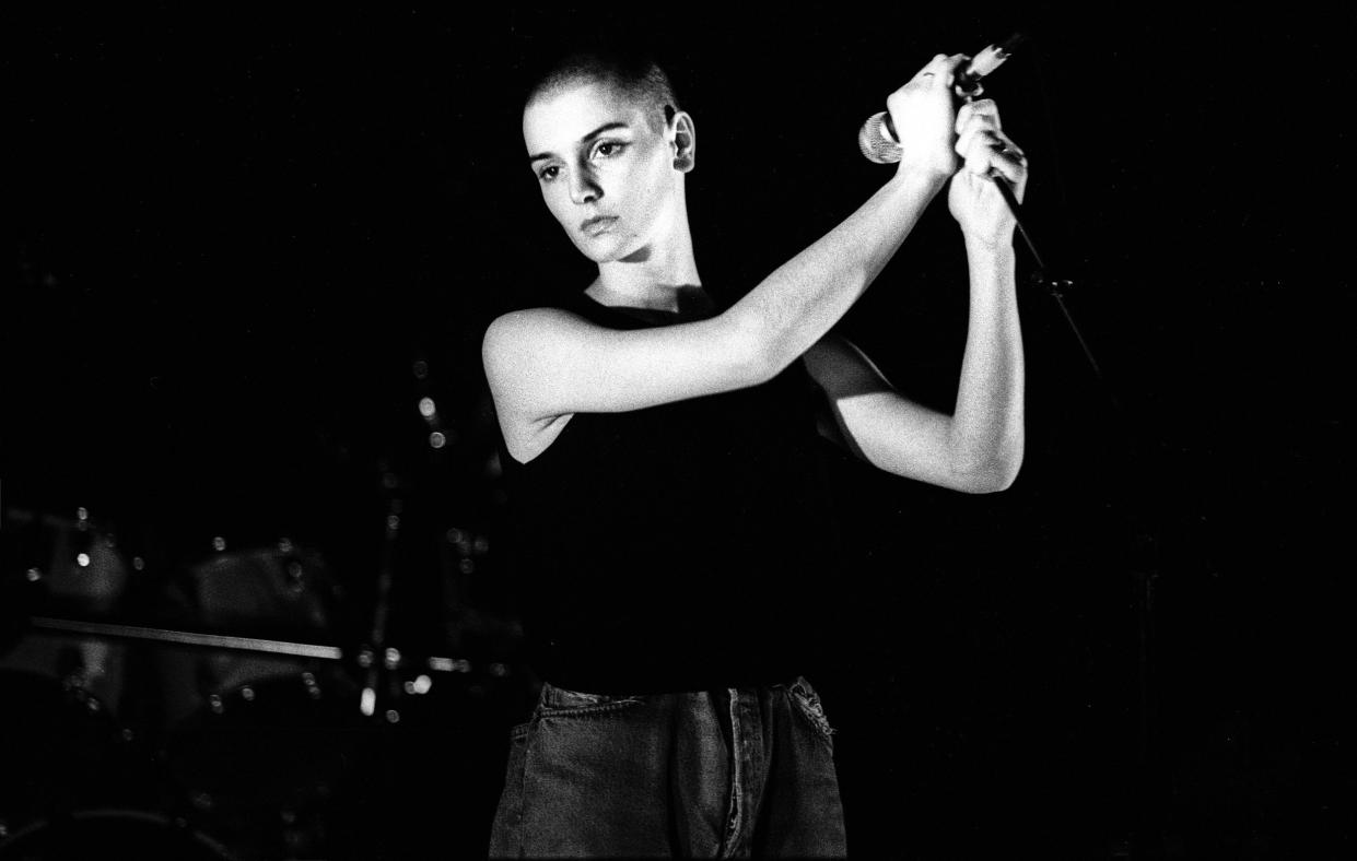 Irish singer Sinead O'Connor performs at Paradiso, Amsterdam, Netherlands, March 16 1988. (Paul Bergen / Redferns)