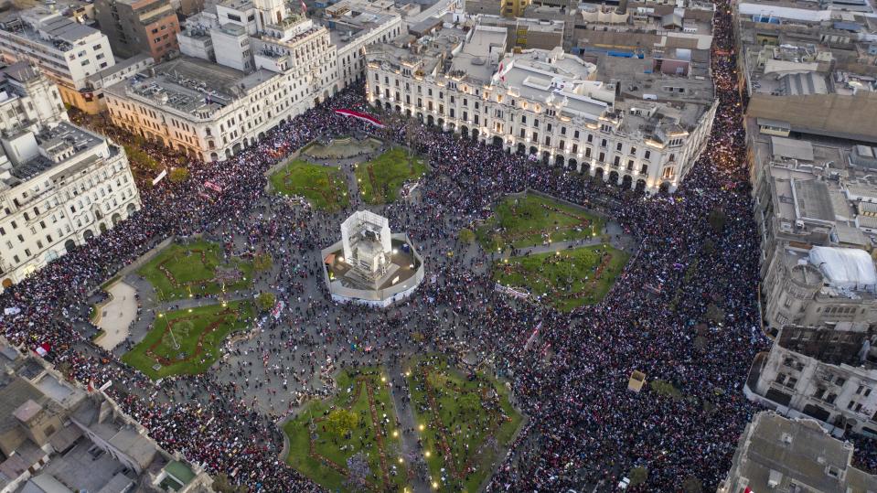 Protesters against the removal of President Martin Vizcarra gather in Plaza San Martin in Lima, Peru, Thursday, Nov. 12, 2020. On Tuesday, Peru swore-in Manuel Merino as Peru’s new president, after the legislature voted Vizcarra out of office on Monday. (AP Photo/Rodrigo Abd)