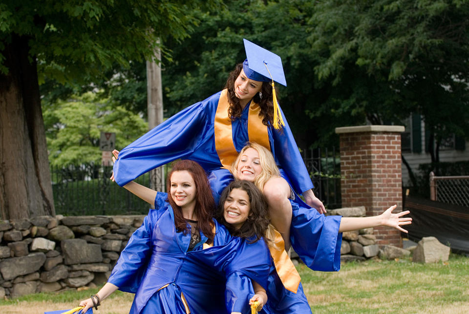 The friends posing for fun graduation photos in a scene from "The Sisterhood of the Traveling Pants"