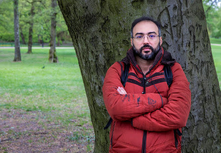 Author and blogger Iyad el-Baghdadi poses for a photo, as he says he is under protection custody in Norway, after the CIA warned him of being threatened by Saudi Arabia, in Oslo, Norway. May 7, 2019. Picture taken May 7. Ole Berg-Rusten/ NTB Scanpix/via REUTERS