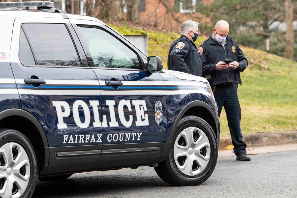 Fairfax County Police position themselves outside the home of fallen officer Brian Sicknick on Jan. 8, 2021 in Springfield, Va.