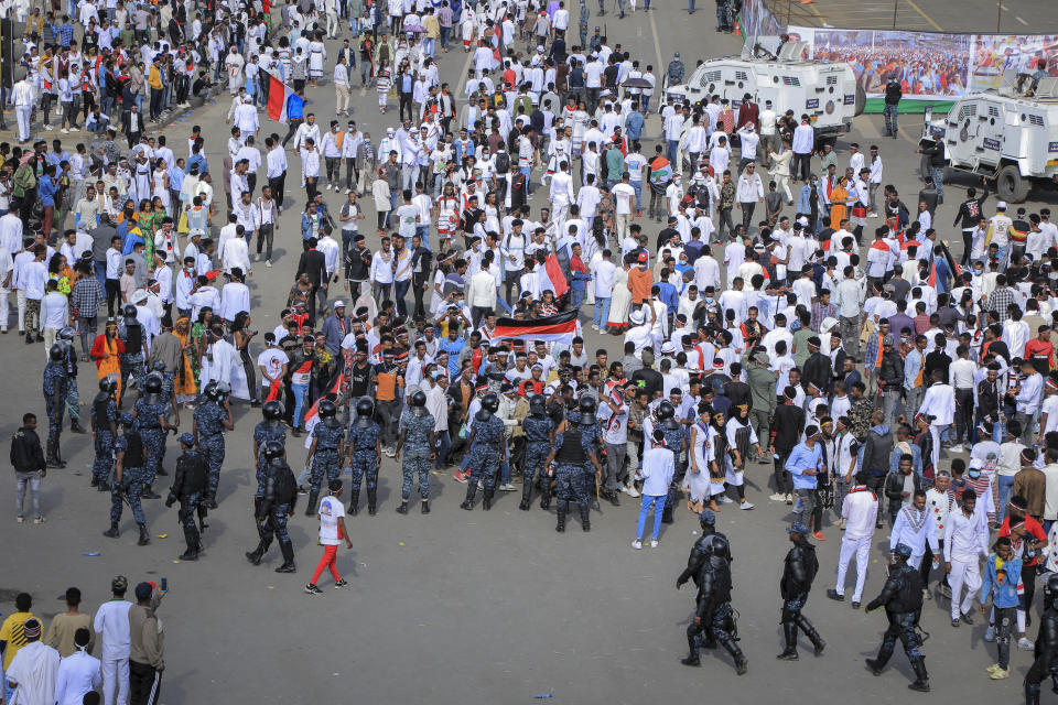 Oromos attend the annual Irreecha festival in the capital Addis Ababa, Ethiopia, Saturday, Oct. 2, 2021. Ethiopia's largest ethnic group, the Oromo, on Saturday celebrated the annual Thanksgiving festival of Irreecha, marking the end of winter where people thank God for the blessings of the past year and wish prosperity for the coming year. (AP Photo)