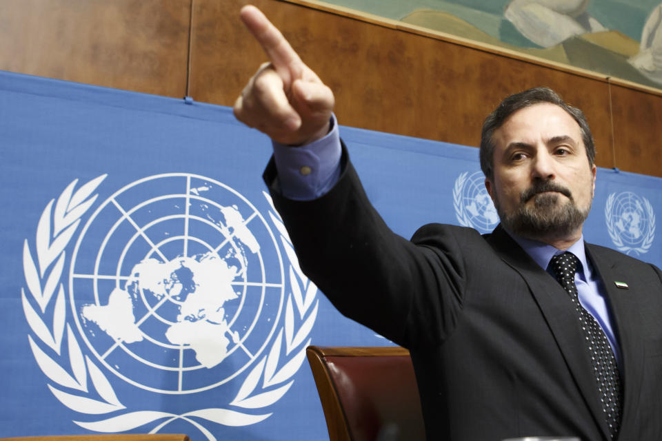 Louay Safi, spokesperson for the Syrian National Coalition, speaks to the media during a news conference after the second round of negotiations between the Syrian government and the opposition at the European headquarters of the United Nations, in Geneva, Switzerland, Friday, Feb. 14, 2014. (AP Photo/Keystone, Salvatore Di Nolfi)