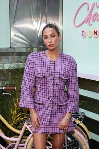 <p>Jamie McCarthy/WireImage</p> Alix Earle attends Chanel NYFW event at Lucky Chance Diner in Brooklyn, New York