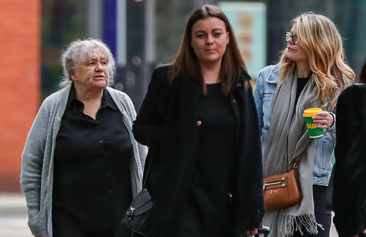 Christina Pomfrey (left), 65, and Aimee Brown (centre left), 34, arrive at Minshull Street Crown Court in Manchester to face sentencing for charges of benefit fraud.