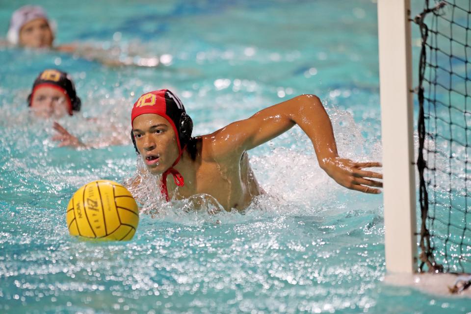 Palm Desert goalie Donovan Goree eyes the ball against Xavier Prep in their DEL water polo championship game held at Shadow Hills High School in Indio, Calif., on Tuesday, Oct. 25, 2022.