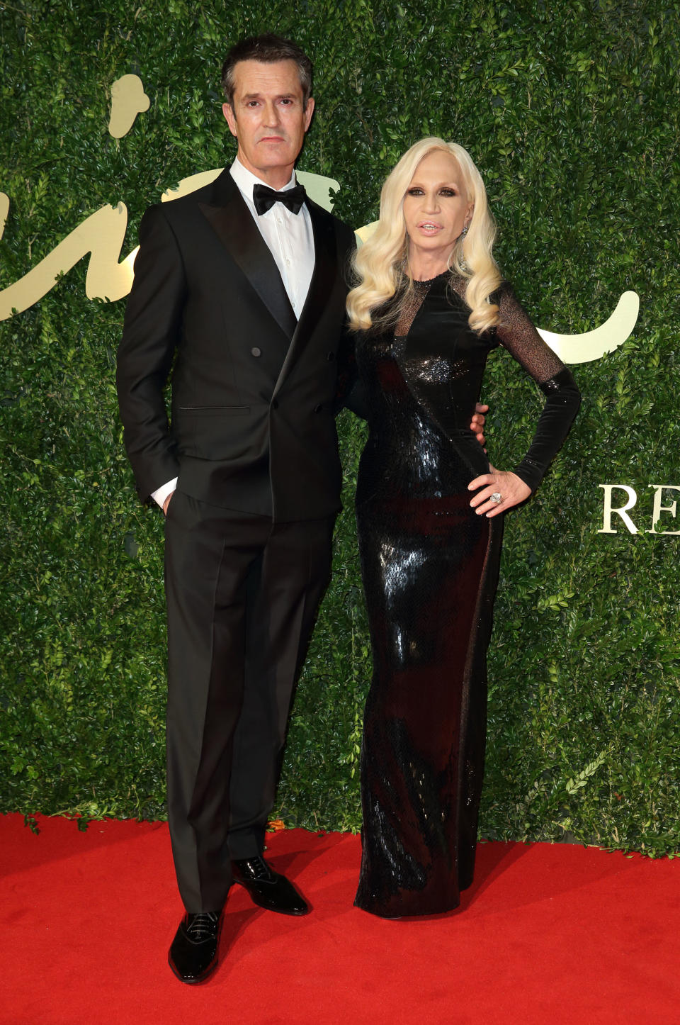 With Rupert Everett at the British Fashion Awards in 2013