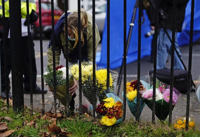 Flowers at the scene in Collingwood Road, Sutton, south London (Aaron Chown/PA)