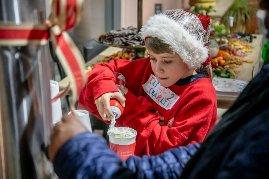 The Angel Tree Christmas Party at Talsma Furniture near Grand Rapids on Nov. 30, 2023. (Michael Buck/WOOD TV8)