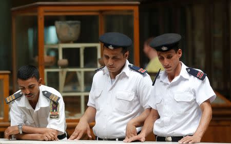 Policemen secure the area around pharaonic artifacts inside the Egyptian Museum in Cairo, Egypt June 23, 2016. REUTERS/Amr Abdallah Dalsh