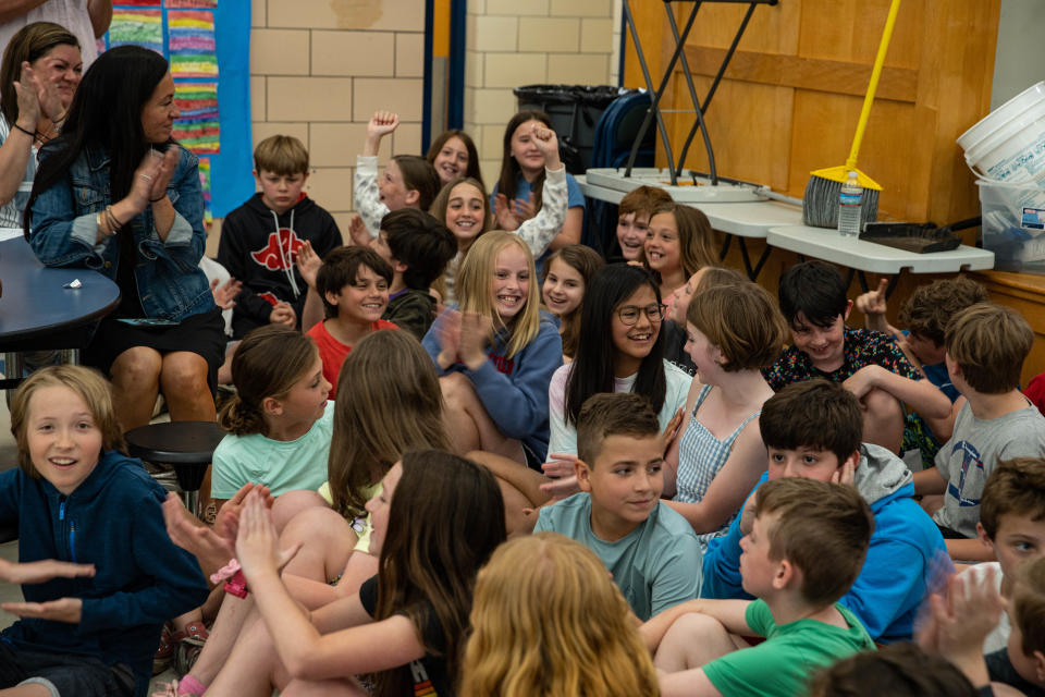 Students of Gretchen Abbott's class celebrate victory during the "Vinal Book Bee" competition at Vinal Elementary School in Norwell on Friday, May 27, 2022.