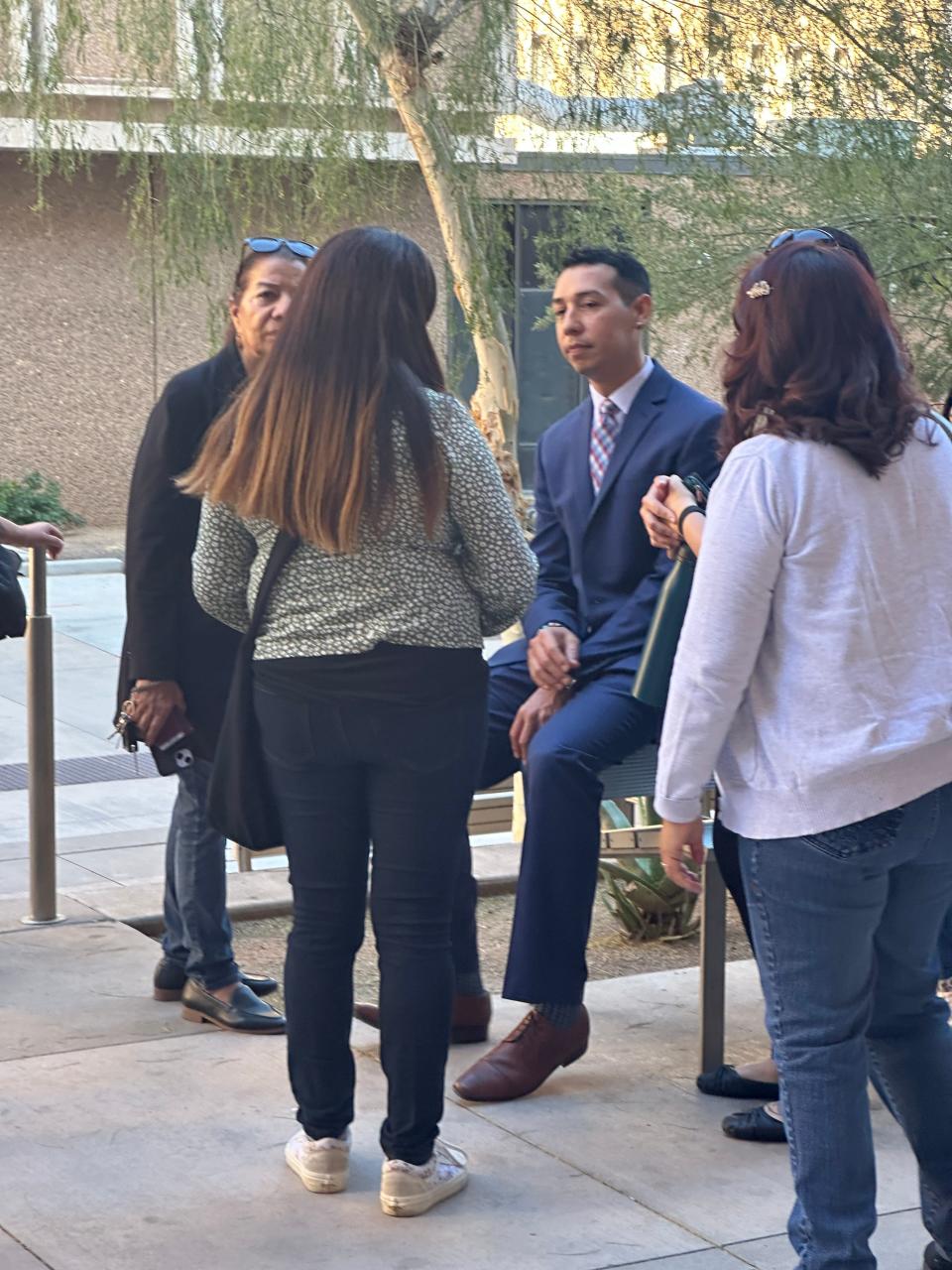 Former state Sen. Otoniel "Tony" Navarrete speaks with family members and supporters outside the courtroom after a jury found him guilty on a child-sex count on Feb. 29, 2024. The jury found him not guilty on two other charges related to a teenage boy's allegations against him.