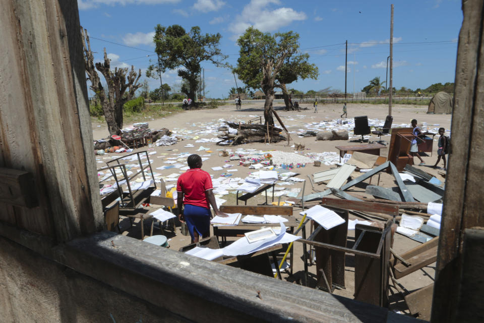 School books at Inchope primary school in Inchope, Mozambique, are left to dry in the sun after the school was damaged by Cyclone Idai, Monday March, 25, 2019. Cyclone Idai's death toll has risen above 750 in the three southern African countries hit 10 days ago by the storm, as workers rush to restore electricity, water and try to prevent outbreak of cholera. (AP Photo/Tsvangirayi Mukwazhi)