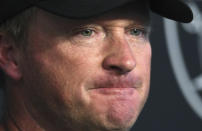 FILE - Las Vegas Raiders head coach Jon Gruden speaks to the media after an NFL football practice in Henderson, Nev., in this Saturday, July 31, 2021, file photo. Jon Gruden is out as coach of the Las Vegas Raiders after emails he sent before being hired in 2018 contained racist, homophobic and misogynistic comments. Gruden released a statement Monday night, Oct. 11, 2021, that he is stepping down after The New York Times reported that Gruden frequently used misogynistic and homophobic language directed at Commissioner Roger Goodell and others in the NFL.(AP Photo/David Becker, File)