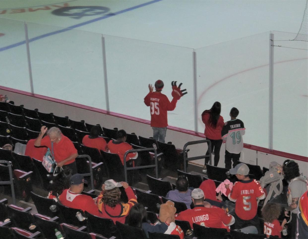 Florida Panthers fan Fedor Khramtsov watches on in dismay as the clock winds down during the Panthers' Game 6 loss (June 21, 2024).