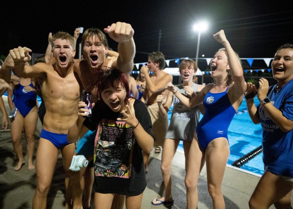 Barron Collier swimmers celebrate winning the Collier County Athletic Conference swimming and diving championships at the Norris Aquatic Center in Naples on Thursday night, October 13, 2022.Photo by Darron R. Silva/Special to the Naples Daily News