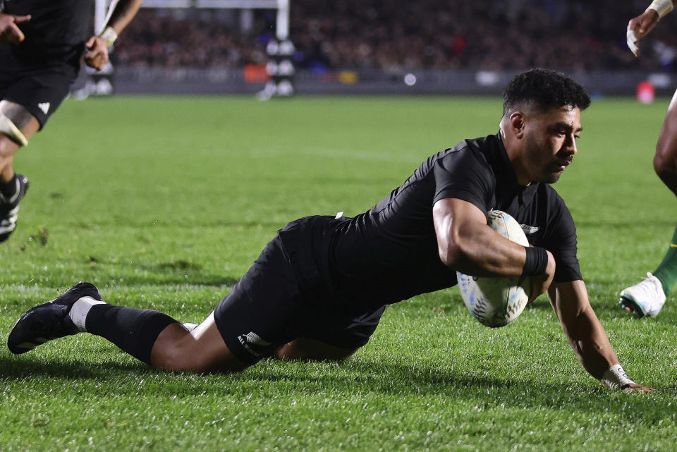 New Zealand's Richie Mo'unga scores a try during the Rugby Championship test match between the All Blacks and South Africa at Mt Smart Stadium in Auckland, New Zealand, Saturday, July 15, 2023. ( Aaron Gillions/Photosport via AP)
