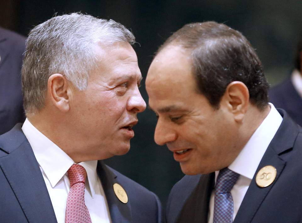 Egyptian President Abdel-Fattah el-Sissi, right, listens to Jordan's King Abdullah II during a group picture ahead of Islamic Summit of the Organization of Islamic Cooperation (OIC) in Mecca, Saudi Arabia, early Saturday, June 1, 2019. Muslim leaders from some 57 nations gathered in Islam's holiest city of Mecca late Friday to discuss a breadth of critical issues ranging from a spike in tensions in the Persian Gulf, to Palestinian statehood, the plight of Rohingya refugees and the growing threat of Islamophobia. (AP Photo/Amr Nabil)