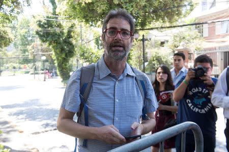 Jose Andres Murillo, one of the victims of sexual abuse, allegedly committed by members of the church, is seen after a meeting with the Vatican special envoy Archbishop Charles Scicluna in Santiago, Chile February 20, 2018. REUTERS/Claudio Santana NO RESALES. NO ARCHIVE.