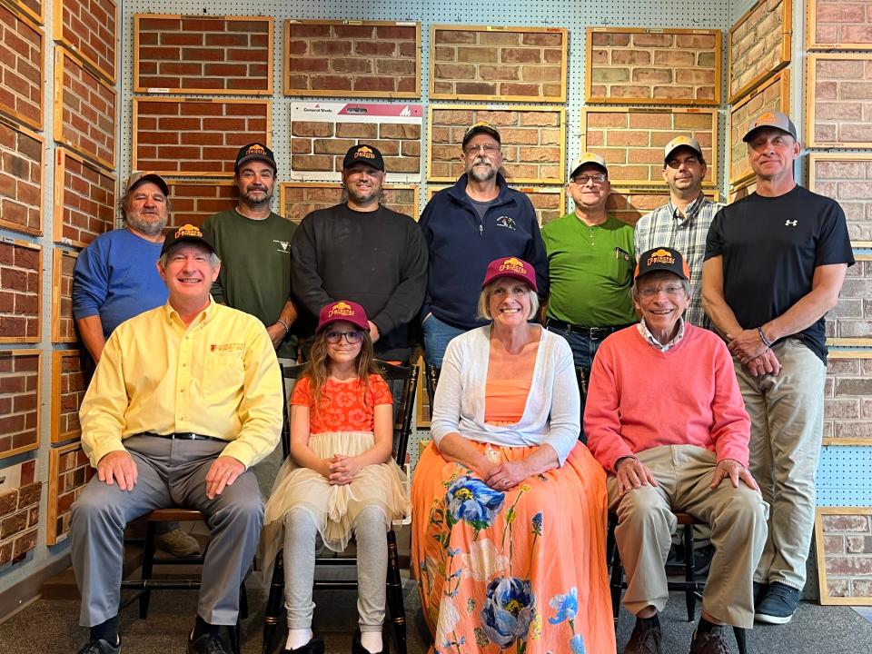 The owners and staff and family of Steffey and Findlay, which has been in business 150 years.