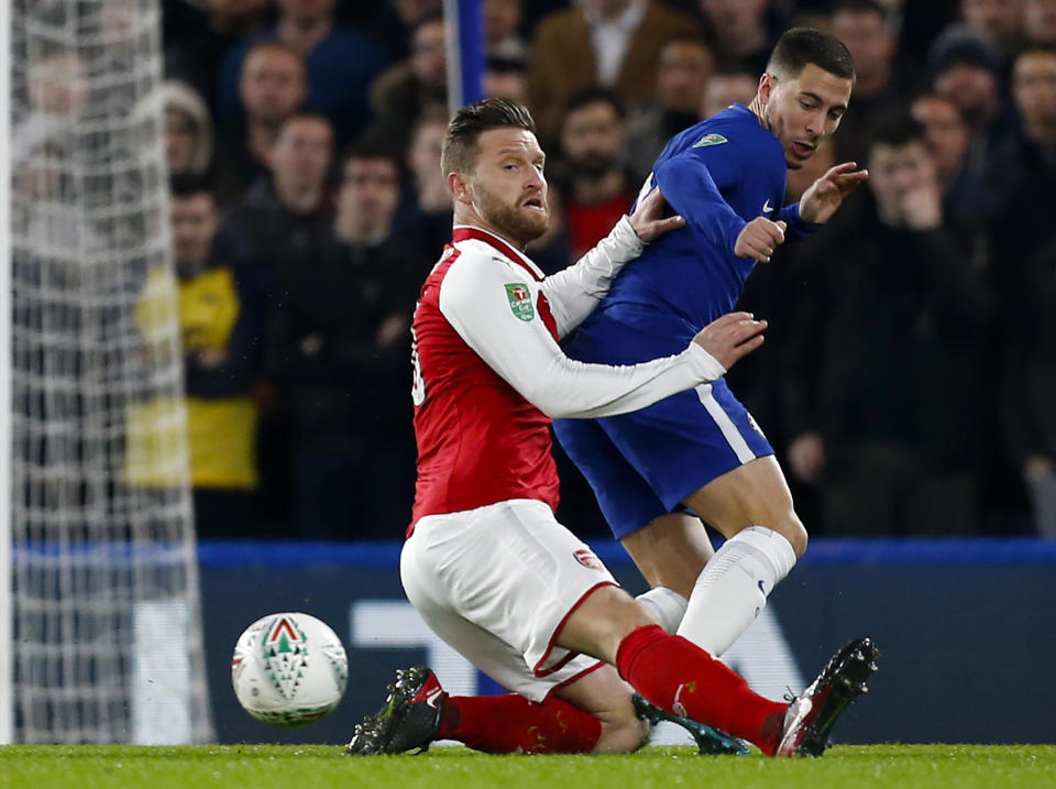 Eden Hazard is challenged by Shkodran Mustafi: Getty