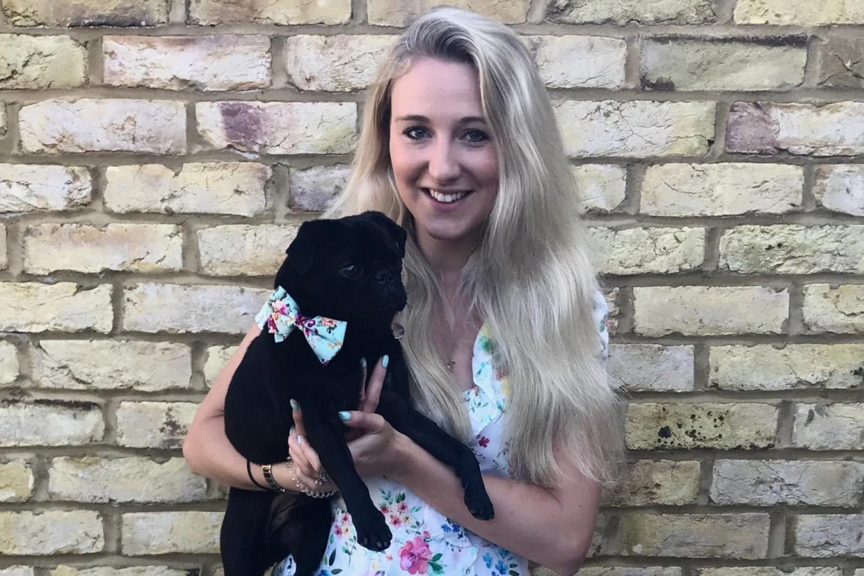 Pride and joy: Emily Hunt with her pug Percy. She and her partner moved home for the sake of her dog: Emily Hunt