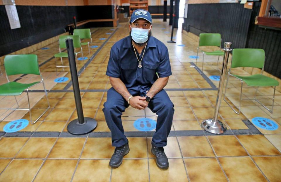 Longshoreman Alex Yanes sits in an empty union hall at the International Longshoremen’s Association Local 1416 in Overtown on June 15, 2020. His last day of work at PortMiami was April 18.