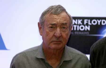 Band member Nick Mason poses for photographers at a media event to promote "The Pink Floyd Exhibition: Their Mortal Remains", which will open in May 2017, in London, Britain, February 16, 2017. REUTERS/Neil Hall