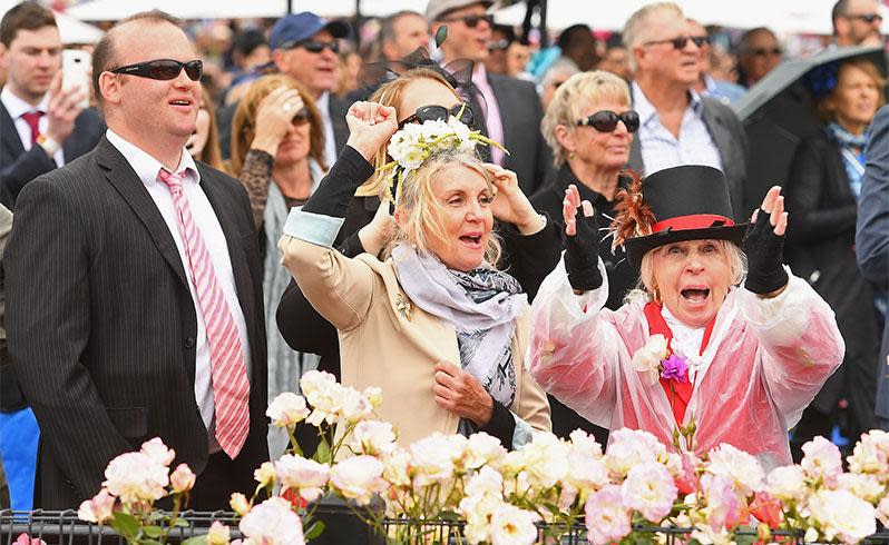 <p>A bit of rain wasn't going to stop these racegoers from enjoying themselves.</p>