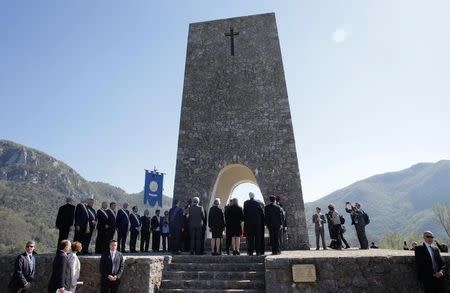 U.S. Secretary of State Rex Tillerson, Italy's Foreign Minister Angelino Alfano and E.U. High Representative for Foreign Affairs Federica Mogherini attend a ceremony at the Sant'Anna di Stazzema memorial, dedicated to the victims of the massacre committed in the village of Sant'Anna di Stazzema by the Nazis in 1944 during World War II, Italy April 10, 2017. REUTERS/Max Rossi