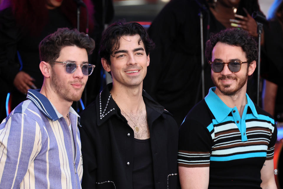 NEW YORK, NEW YORK - MAY 12: (L-R) Nick Jonas, Joe Jonas, and Kevin Jonas of the Jonas Brothers perform on NBC's 