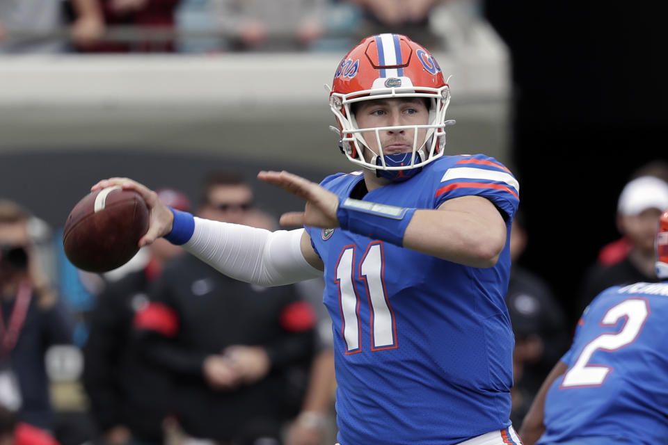 FILE -In this Nov. 2, 2019, file photo, Florida quarterback Kyle Trask throws a pass against Georgia during the first half of an NCAA college football game in Jacksonville, Fla. Isolated from coaches, teammates and friends during the coronavirus pandemic, Kyle Trask found plenty of extra free time this offseason. He reviewed each of his performances from his breakout year, trying to find and fix every flaw in hopes of improving the eighth-ranked Gators’ chances of becoming Southeastern Conference and national championship contenders in 2020. (AP Photo/John Raoux, File)