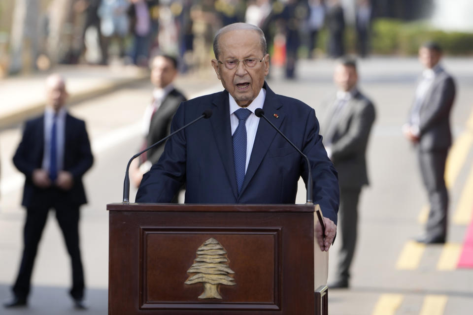 Lebanese President Michel Aoun delivers a speech to his supporters gathered outside the presidential palace in Baabda, east of Beirut, Lebanon, Sunday, Oct. 30, 2022. Aoun left Lebanon's presidential palace Sunday marking the end of his six-year term without a replacement, leaving the small nation in a political vacuum that is likely to worsen its historic economic meltdown. (AP Photo/Bilal Hussein)