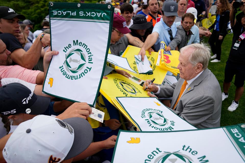 Jun 5, 2024; Columbus, Ohio, USA; Jack Nicklaus signs autographs for a crowd of eager fans during a practice day for the Memorial Tournament at Muirfield Village Golf Club.