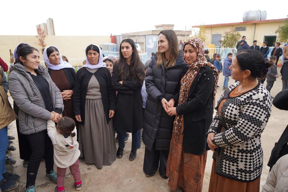 Angelina Jolie and human rights activist Nadia Murad meeting with survivors of genocide in Iraq photos can be credited to Nadia's Initiative.
