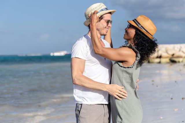 <p>John Parra/Getty</p> Matthew Lawrence and Chilli pose for a photo in front of water at Sandals Dunn's River on Feb. 10, 2024 in Ocho Rios, Jamaica