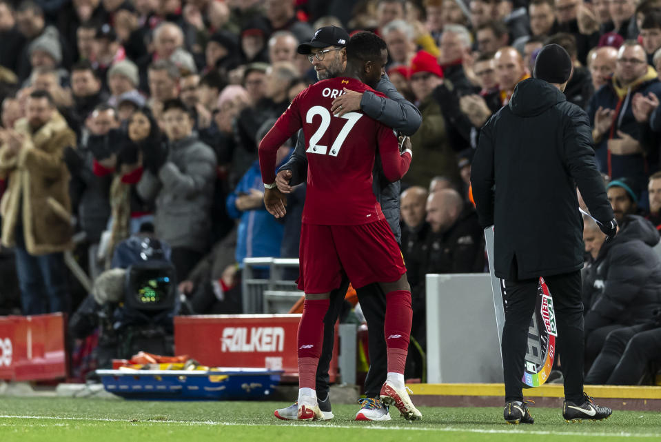 LIVERPOOL, ENGLAND - DECEMBER 04: Liverpool Manager Jurgen Klopp congratulates Divock Origi of Liverpool as he is substituted during the Premier League match between Liverpool FC and Everton FC at Anfield on December 4, 2019 in Liverpool, United Kingdom. (Photo by Daniel Chesterton/Offside/Offside via Getty Images)