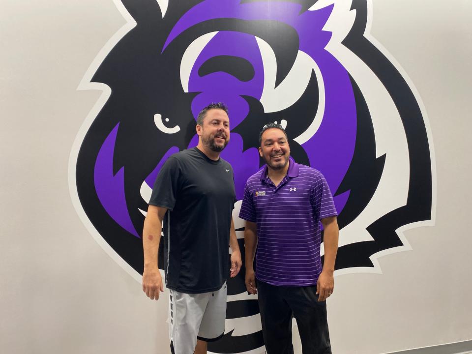 Millennium boys basketball coach Ty Amundsen and Athletic Director Remigio Gordillo give a tour of their new gym.