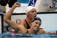 LONDON, ENGLAND - JULY 29: Dana Vollmer of the United States celebrates after winning the gold medal and setting a new world record time of 55.98 seconds in the Women's 100m Butterfly final on Day 2 of the London 2012 Olympic Games at the Aquatics Centre on July 29, 2012 in London, England. (Photo by Clive Rose/Getty Images)