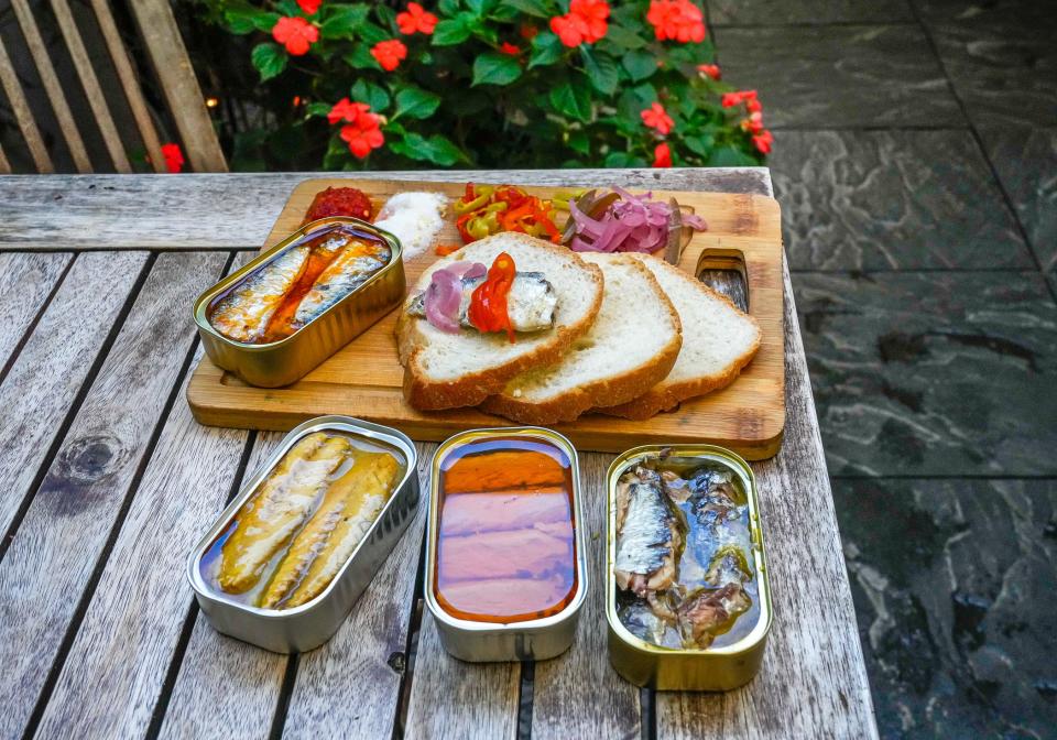 Aguardente, the Portuguese restaurant in Providence, serves curated tins of fish imported from Portugal. A popular trio offers sardines in olive oil, tuna in Molho Cru and mackerel in mustard sauce