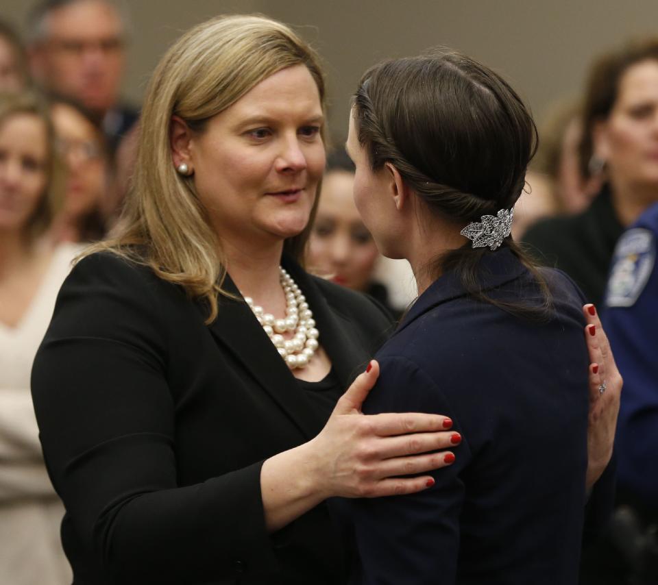 Michigan Assistant Attorney General Angela Povilaitis (L) hugs Rachael Denhollander during&nbsp;Larry Nassar's&nbsp;sentencing phase in Ingham County Circuit Court on Jan. 24, 2018 in Lansing, Michigan. (Photo: JEFF KOWALSKY via Getty Images)