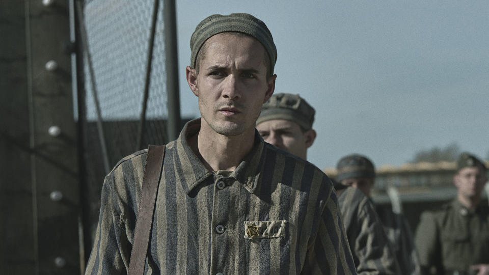 Jonah Hauer-King leads the cast of the powerful Holocaust drama The Tattooist of Auschwitz. (Sky)