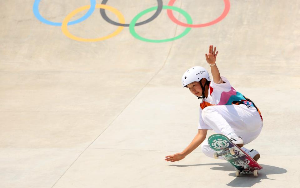 Momiji Nishiya on her way to winning gold in the street skateboarding  - GETTY IMAGES