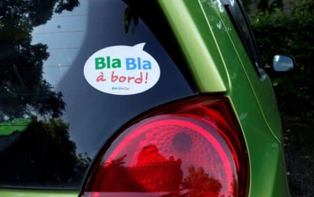 FILE PHOTO: A sticker of French ride-sharing start-up BlaBlaCar is seen on a car May 27, 2017 at Le Coudray-Montceaux, near Paris, France.  REUTERS/Charles Platiau/File Photo